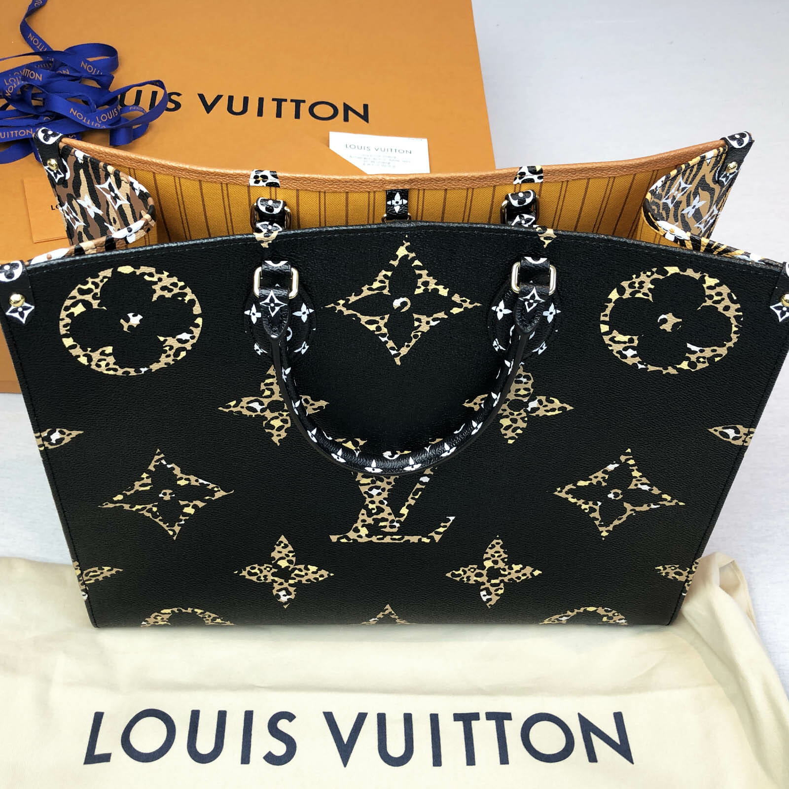 Louis Vuitton Jungle Print On The Go OnTheGo Bag White and Orange -  Handbagholic