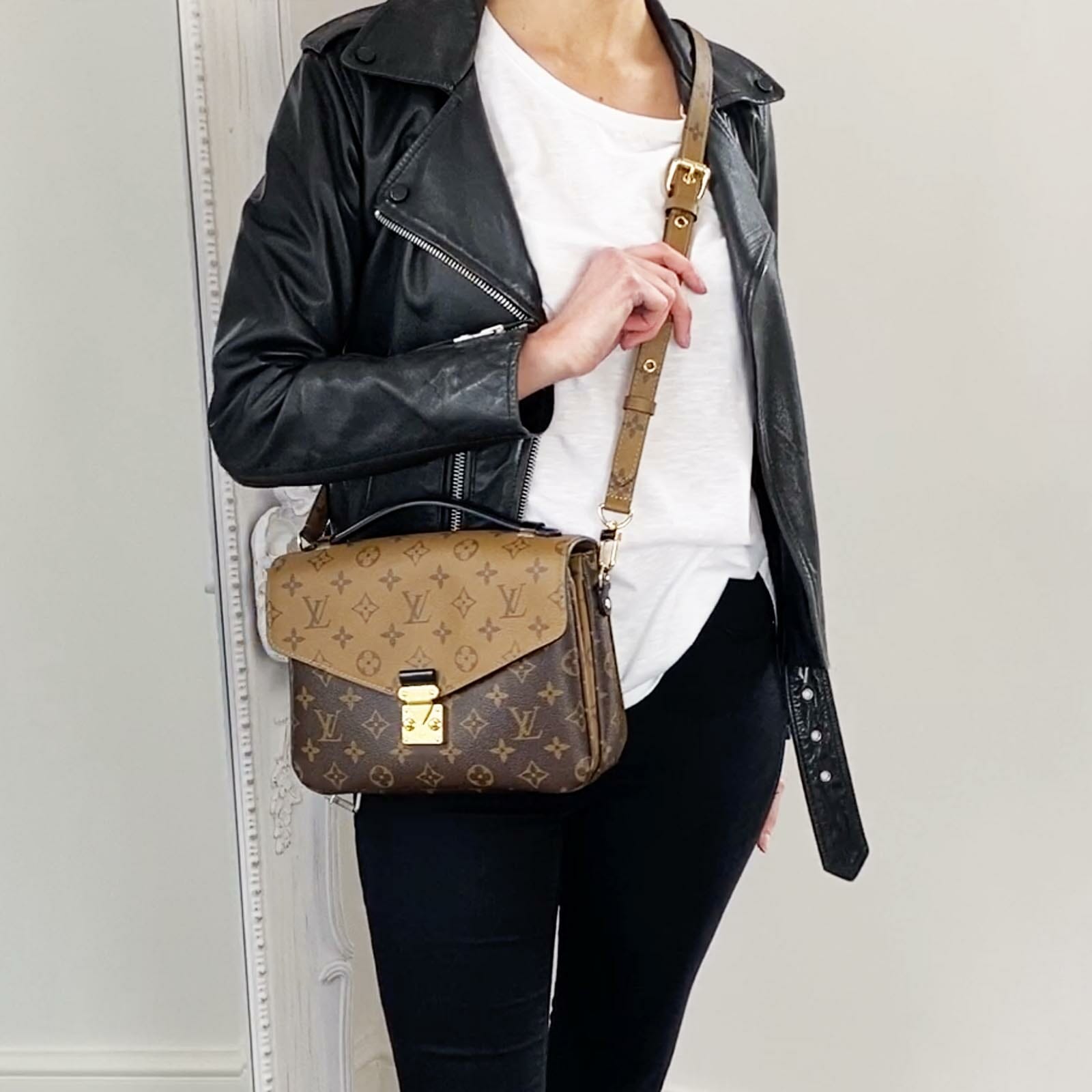 Louis-Vuitton-Pochette-Metis-reverse-monogram-bag-styled-with-leather-jacket-and-jeans