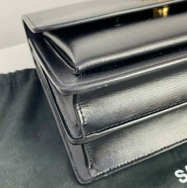 Saint Laurent Medium Black and Gold Sunset Bag Handbagholic