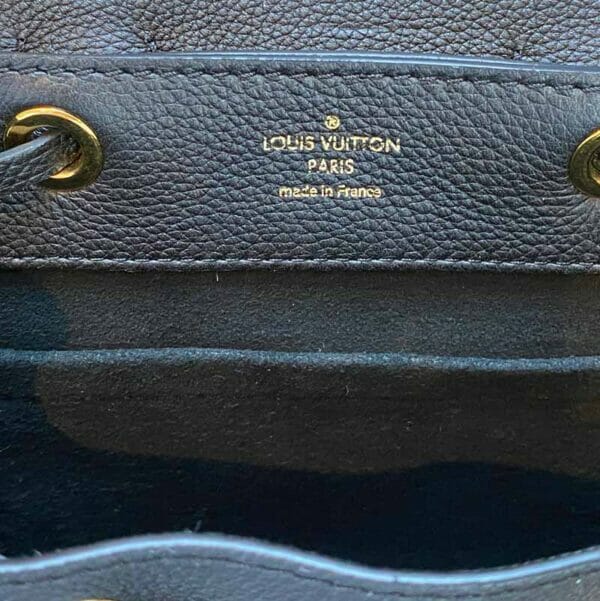 Louis Vuitton LockMe Mini Backpack Black and Gold Logo inside bag