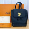 Louis Vuitton LockMe Mini Backpack Black and Gold front