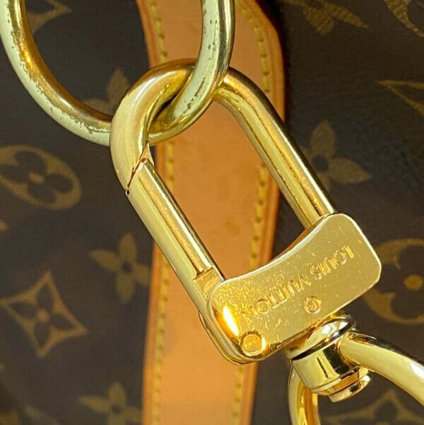 Louis Vuitton monogram keepall 50 vachetta leather hardware close