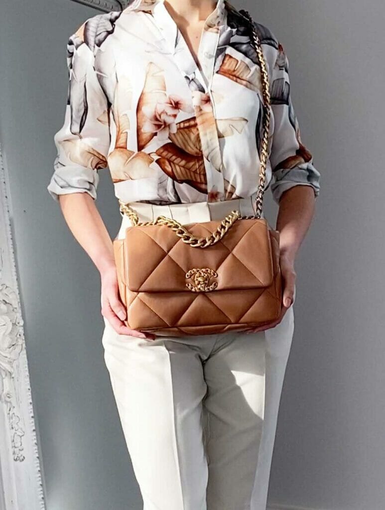 Chanel 19 small caramel bag worn crossbody with summer outfit