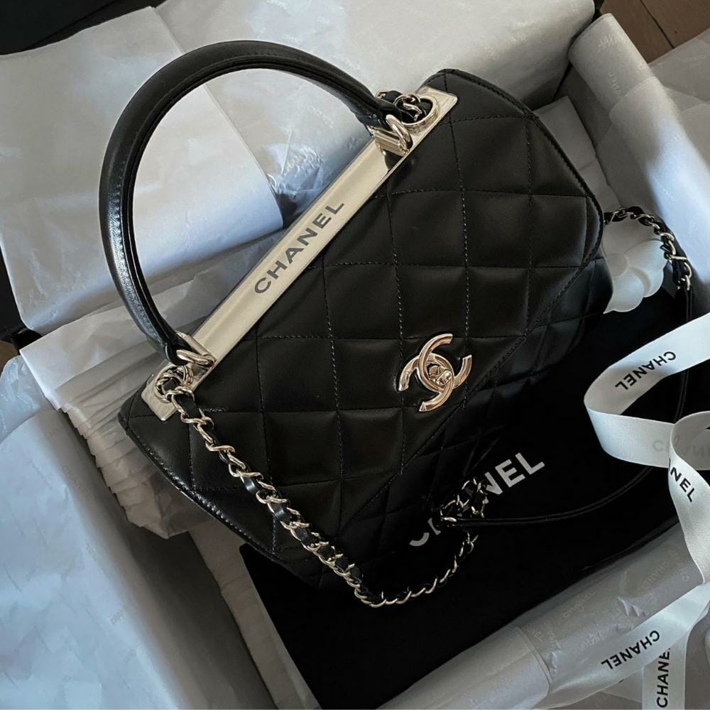 white chanel pouch black