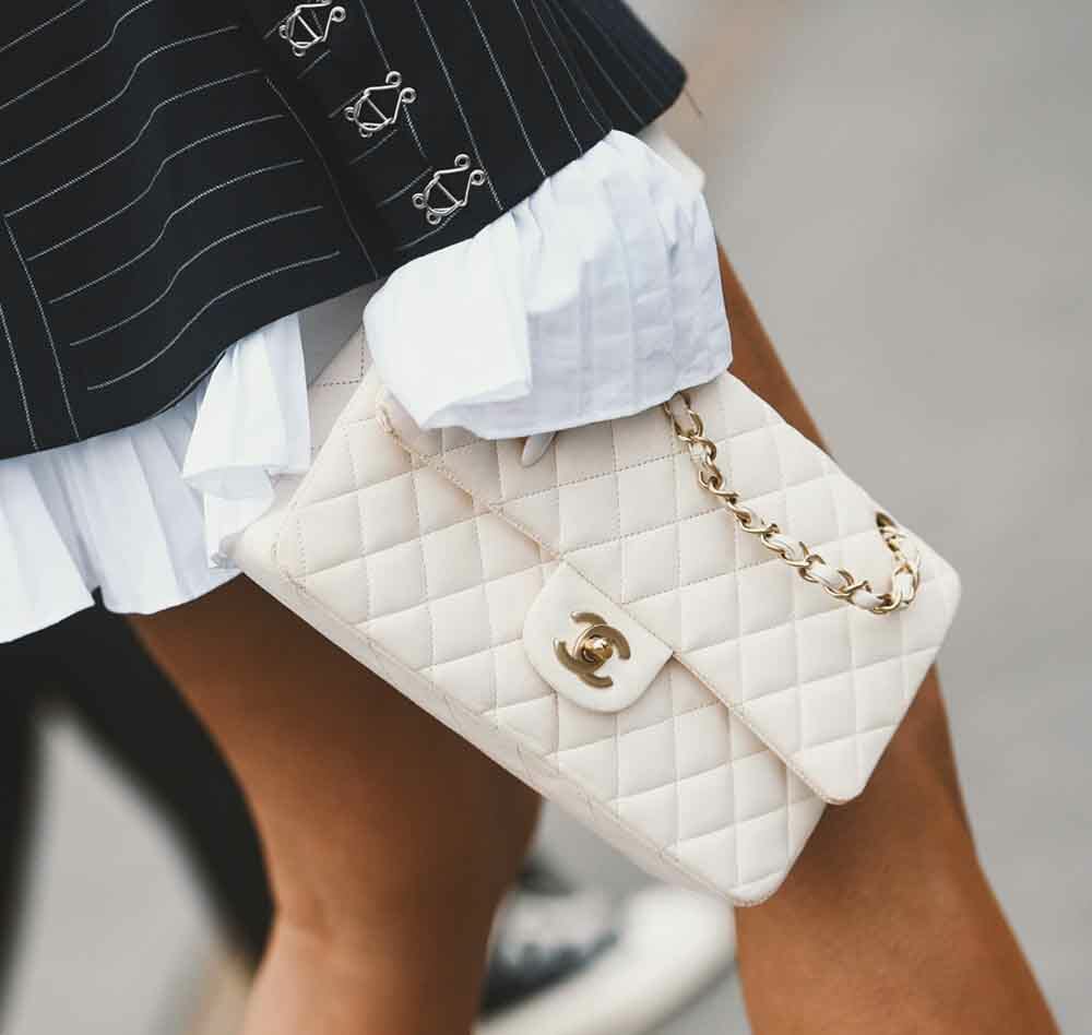 Why Are Chanel Bags So Expensive? The REAL Reason - Handbagholic