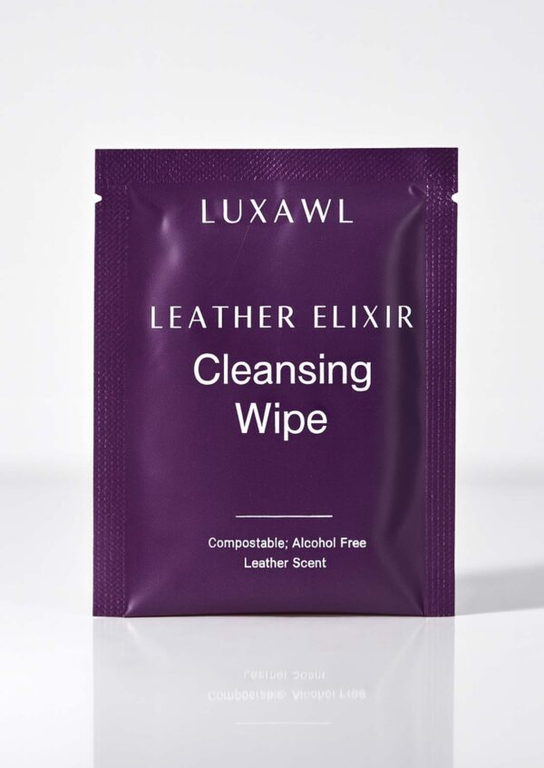 An individually packaged leather cleaning wipe in a dark purple satchet
