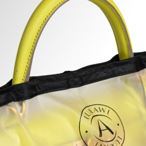 LUXAWL clear bag rain cover with black trim and logo on a hermes kelly bag in colour lime