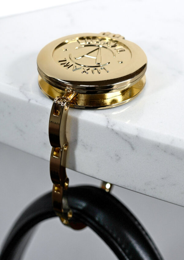 gold-table-hook-for-luxury-bags-on-white-table